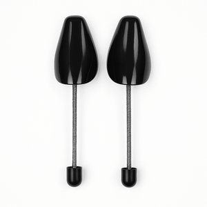 a pair of black shoes with metal tips